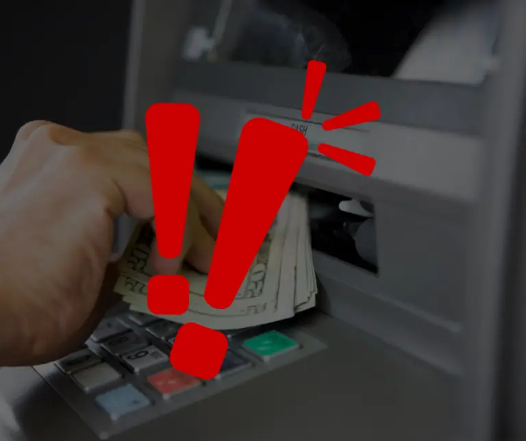 Image of a hand taking cash from an ATM after a successful jackpotting attack